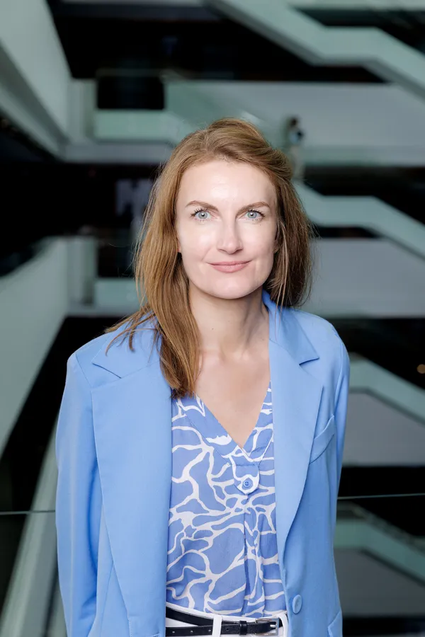 Woman in a light blue blazer